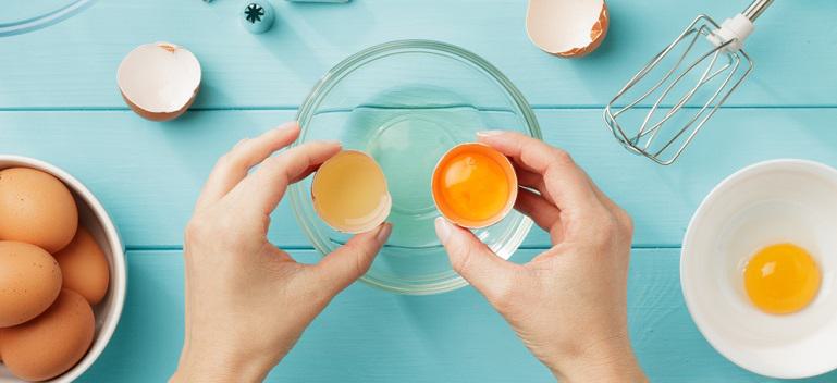 Baking cake, cracking eggs