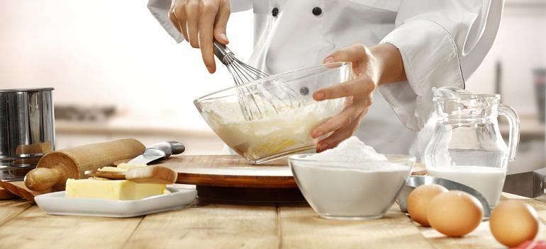 making cake in kitchen